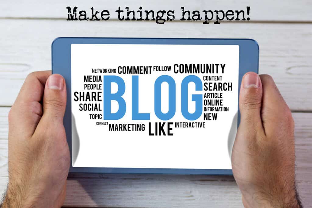 Hands holding a tablet displaying a word cloud related to blogging, with terms like "BLOG," "community," and "marketing." The text "Make things happen!" is shown at the top, highlighting the power of blogging for business.